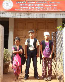 Three Children preparing for their new school