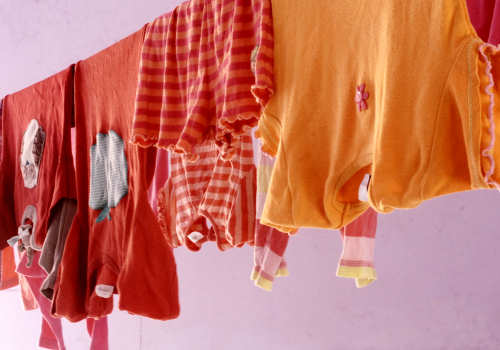 Freshly washed children's clothes ready to be given out