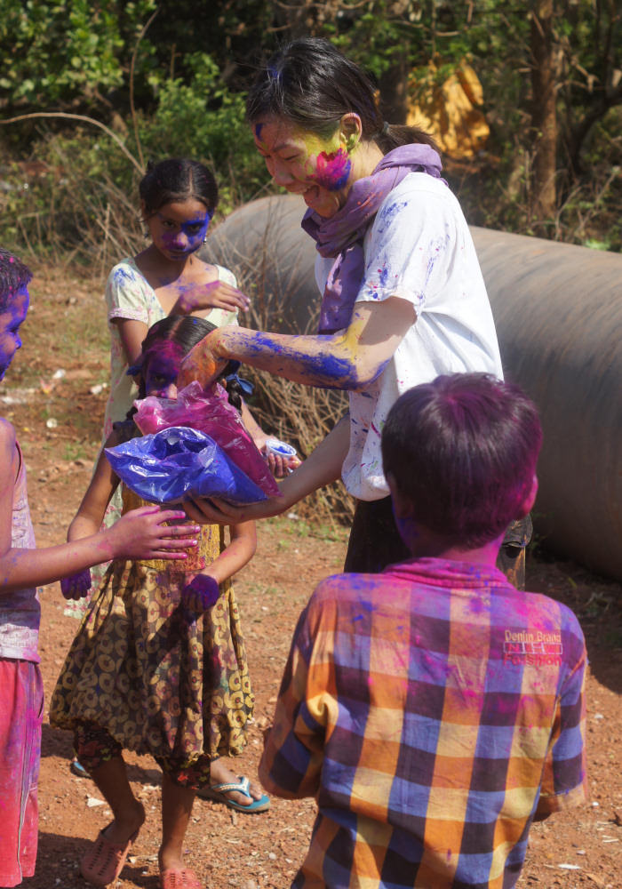 2015/March/Giving-Out-Holi-Colours-For-The-Kids.