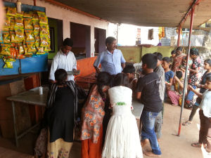 Children Waiting For their malaria tests by the Health Workers