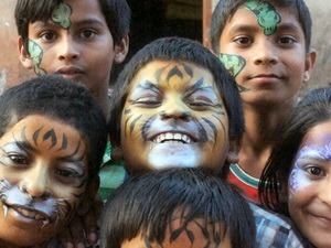 A selection of children with their faces painted